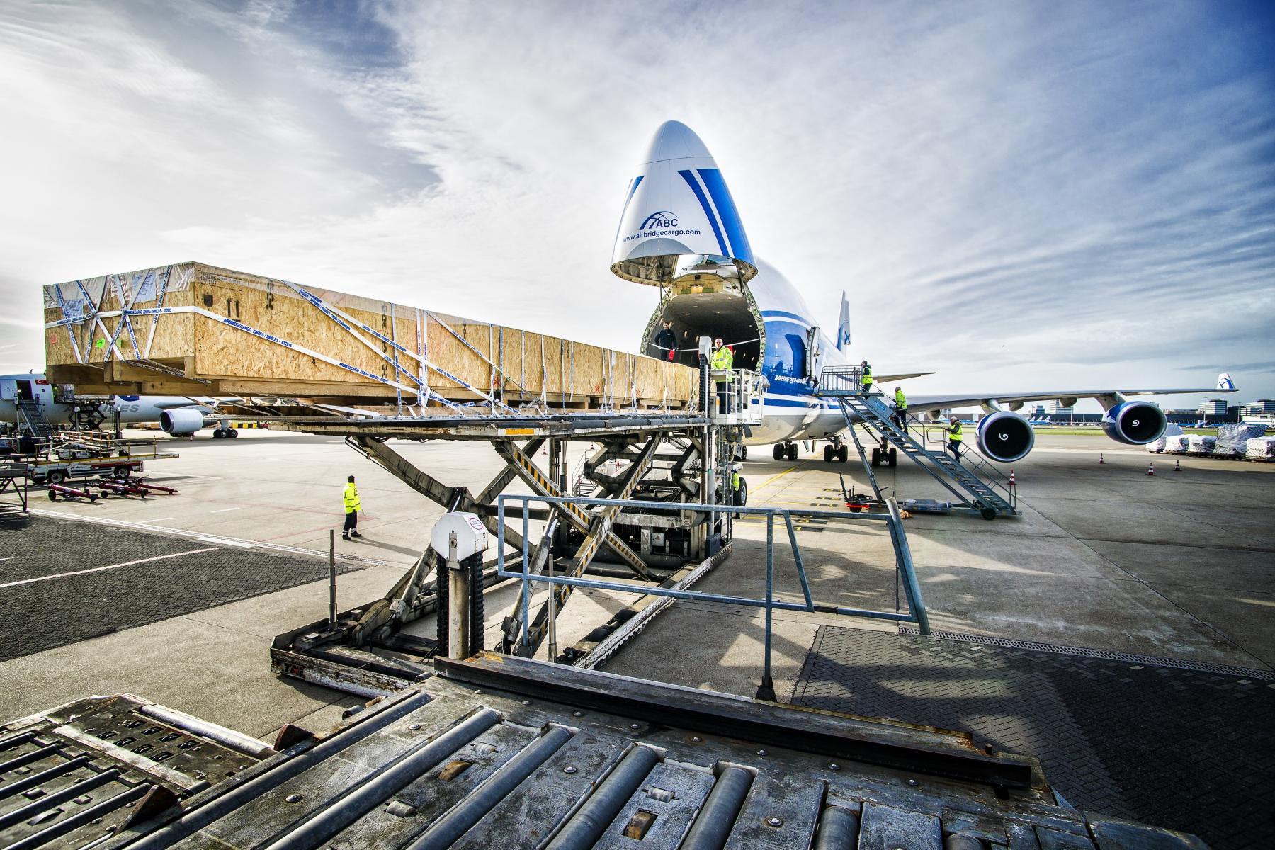 Oversized cargo being loaded onto a freighter aircraft